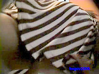The naked booty up the striped skirt of this babe looks wonderful in this hot close up video.